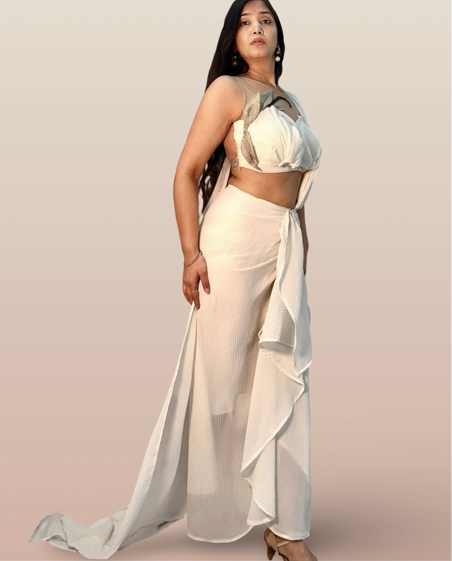 Draped off white saree inspired ensemble in pleated georgette fabric