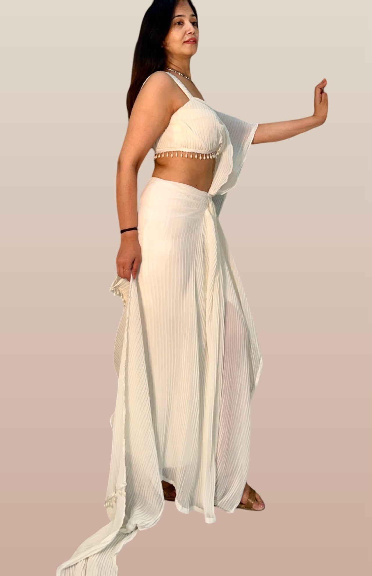 Ivory Draped saree ensemble in pleated georgette fabric