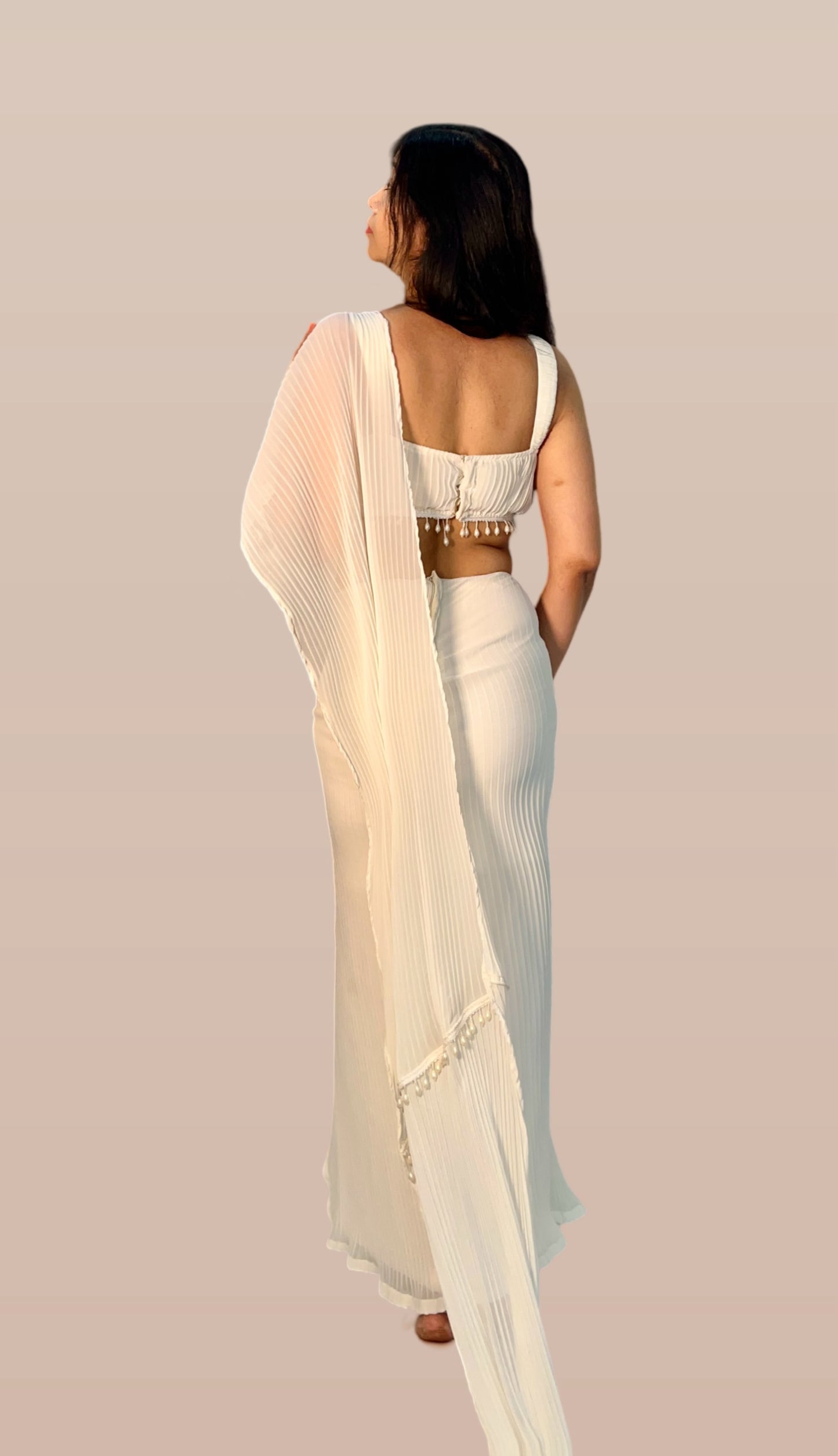 Ivory Draped saree ensemble in pleated georgette fabric