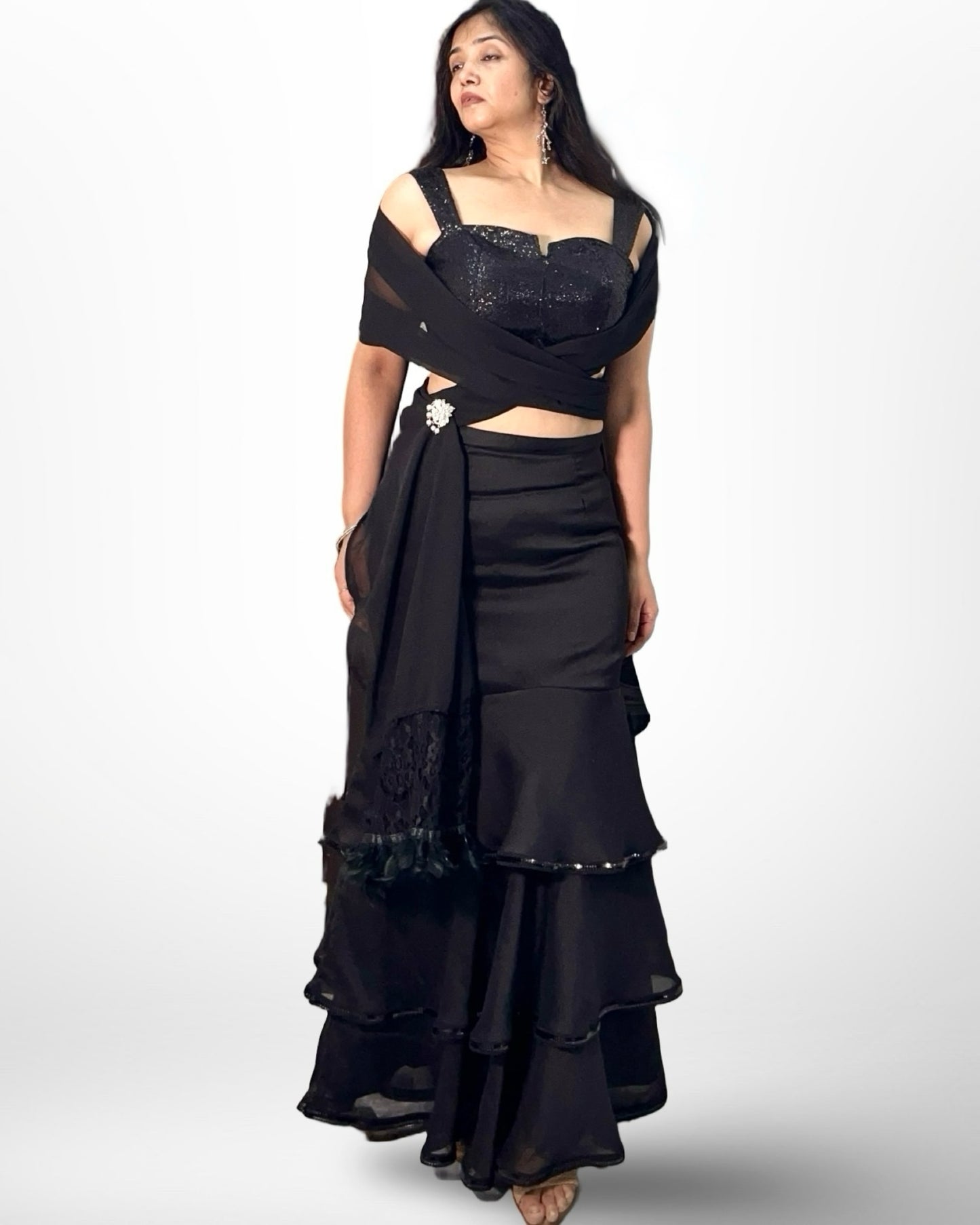 Black Ruffled Saree ensemble with sequins blouse
