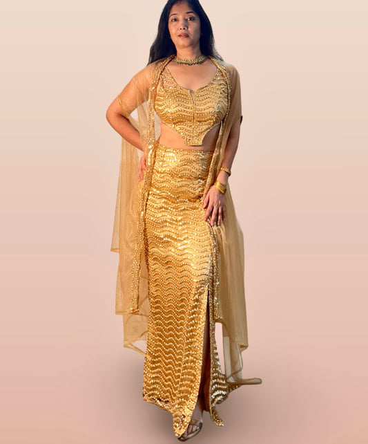 Golden party wear embroidered ensemble in net fabric