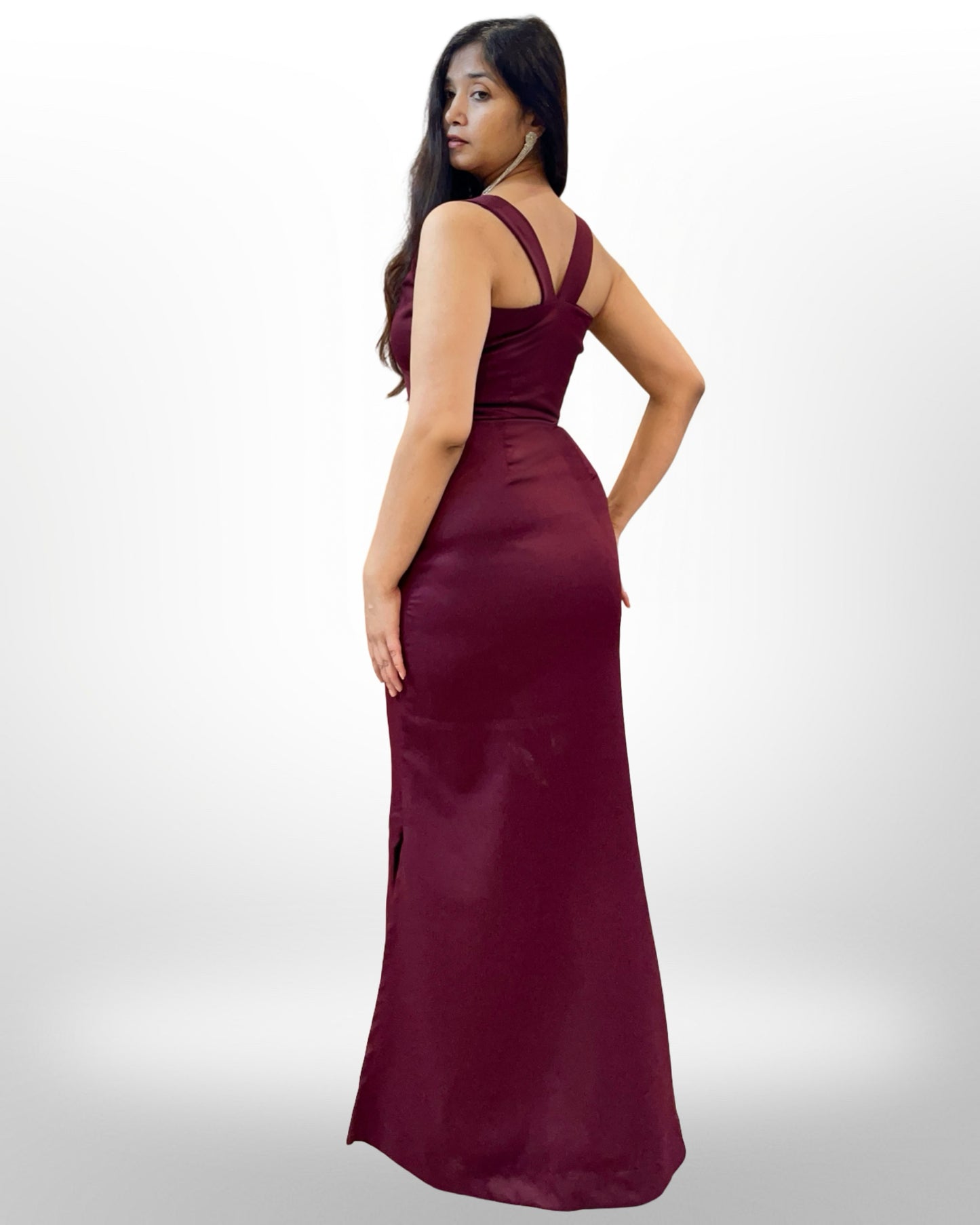 Wine colour stretchable evening gown with sheer net cape
