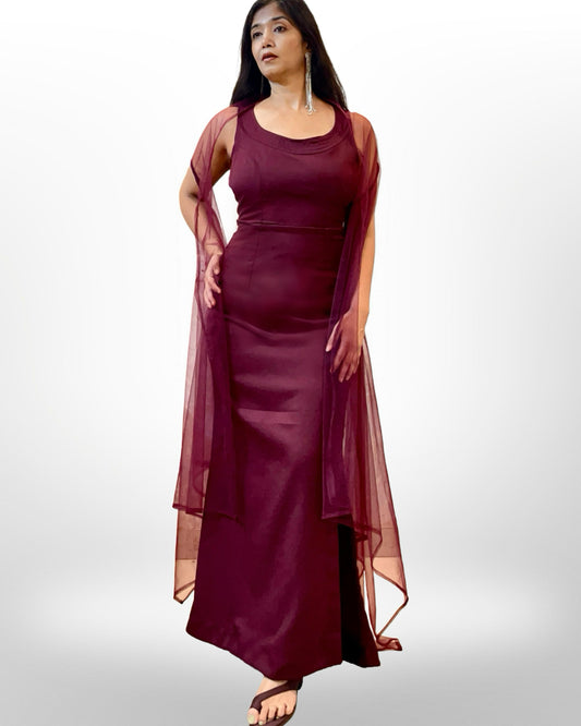 Wine colour stretchable evening gown with sheer net cape