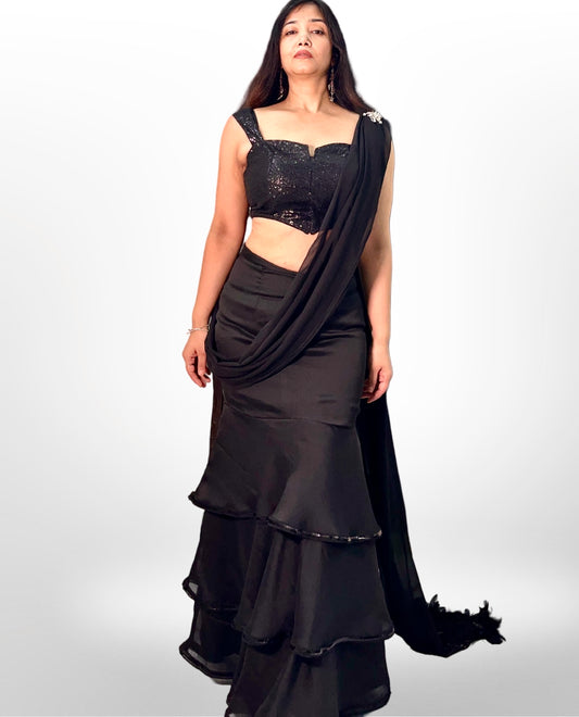 Black Ruffled Saree ensemble with sequins blouse
