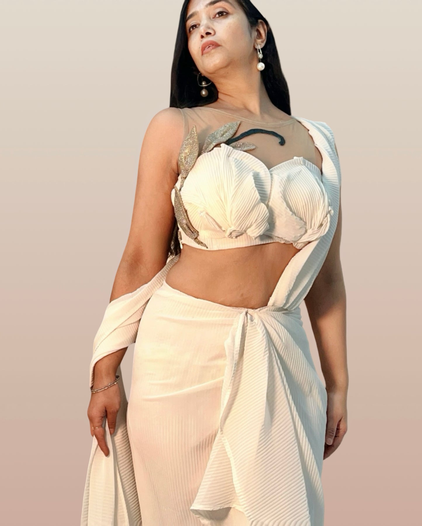 Draped off white saree inspired ensemble in pleated georgette fabric
