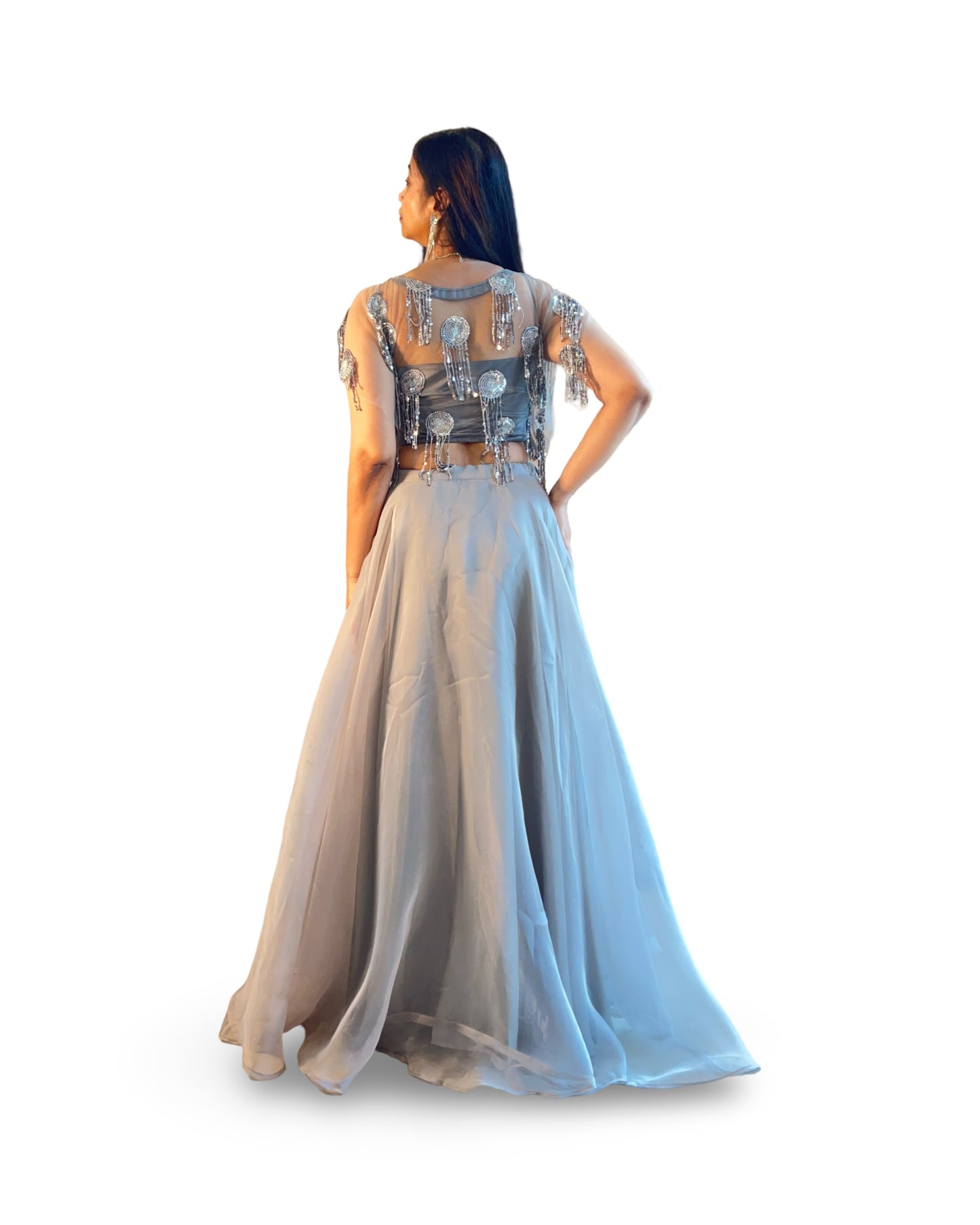 Layered full flared lehnga in organza with embellished net top