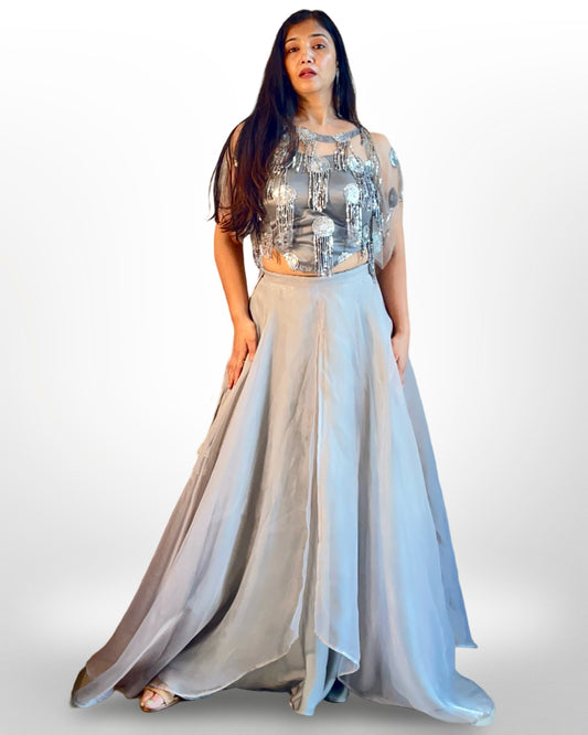 Layered full flared lehnga in organza with embellished net top